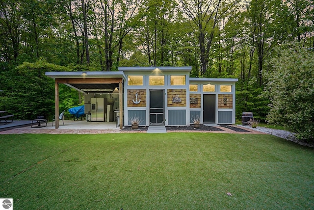 100 Fence Row Cir, Leroy, MI 49655 - view of outbuilding with a carport