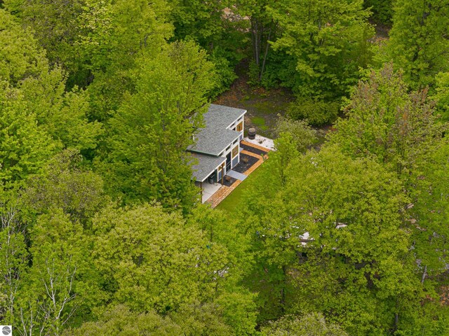 100 Fence Row Cir, Leroy, MI 49655 - view from above of property with a heavily wooded area