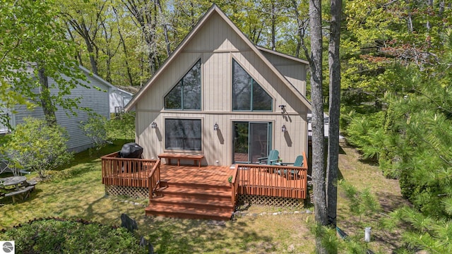 1715 Sunrise Dr, Greenbush, MI 48738 - back of house with a wooden deck