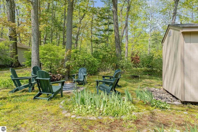 1715 Sunrise Dr, Greenbush, MI 48738 - view of yard with a fire pit