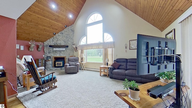 9755 E Deerfield Rd, Shepherd, MI 48883 - carpeted living room with high vaulted ceiling, a fireplace, wooden ceiling, a baseboard heating unit, and healthy amount of natural light