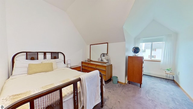 9755 E Deerfield Rd, Shepherd, MI 48883 - bedroom with light colored carpet, vaulted ceiling, and baseboards