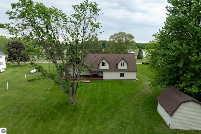 9755 E Deerfield Rd, Shepherd, MI 48883 - view of front of property featuring a front lawn and an outdoor structure