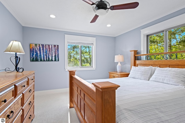 2664 Chandler Rd, Traverse City, MI 49686 - bedroom with light carpet, multiple windows, ornamental molding, baseboards, and ceiling fan