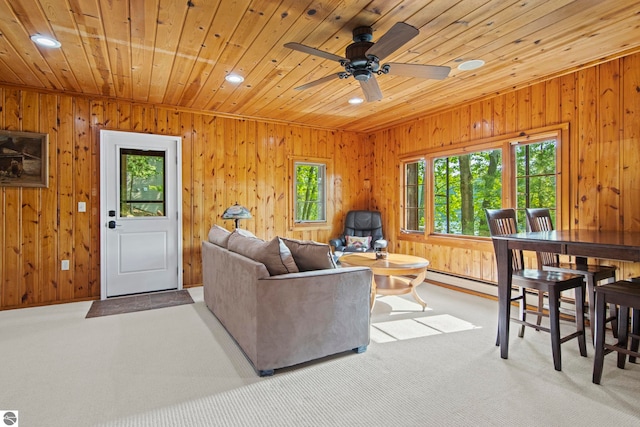 2664 Chandler Rd, Traverse City, MI 49686 - living area with carpet floors, recessed lighting, wood ceiling, wood walls, and ceiling fan