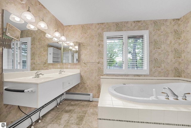 9017 Clam Lake Rd, Bellaire, MI 49615 - bathroom with baseboard heating, a garden tub, double vanity, tile patterned flooring, and baseboards