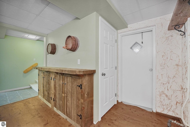 9017 Clam Lake Rd, Bellaire, MI 49615 - foyer with wood finished floors and baseboards