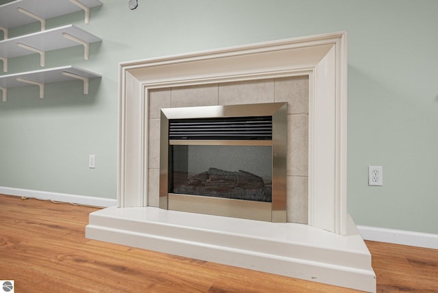 9017 Clam Lake Rd, Bellaire, MI 49615 - detailed view of baseboards and wood finished floors