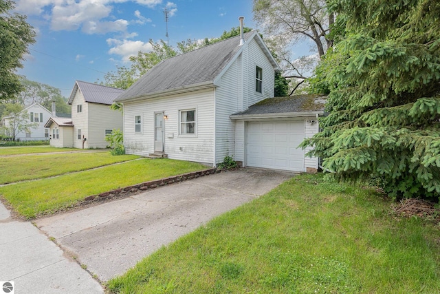 212 Palmer St, Mount Pleasant, MI 48858 - view of property exterior featuring driveway, a garage, a yard, a shingled roof, and entry steps