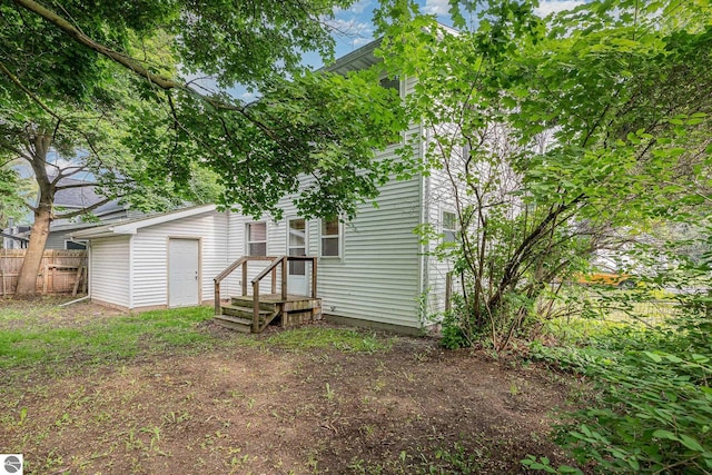 212 Palmer St, Mount Pleasant, MI 48858 - view of rear view of house