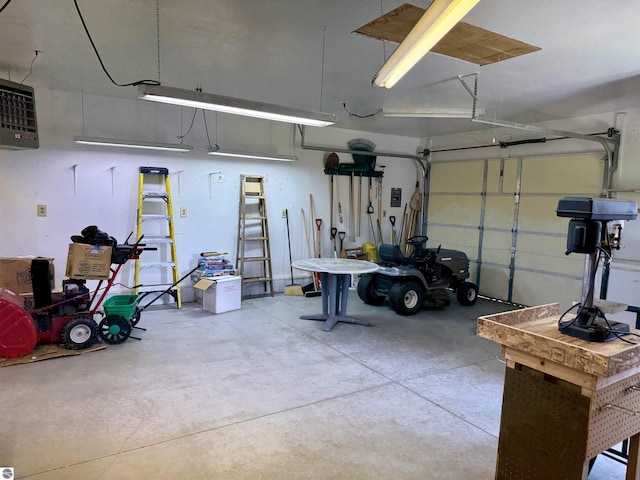 217 Evans St, East Tawas, MI 48730 - garage featuring a heating unit