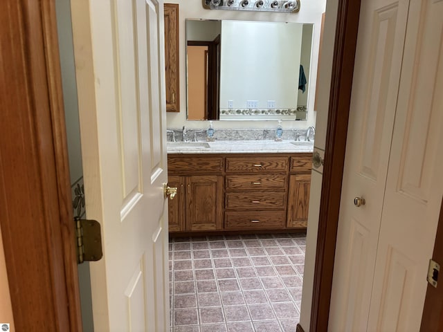 5867 Huron Woods Dr, Tawas City, MI 48763 - full bathroom featuring double vanity