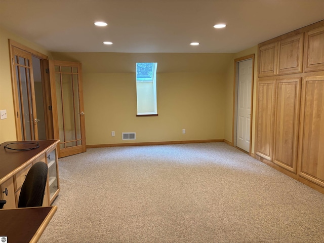 5867 Huron Woods Dr, Tawas City, MI 48763 - unfurnished bedroom featuring recessed lighting, light colored carpet, and baseboards