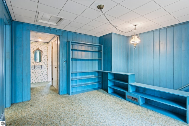 12570 N Cathead Point Rd, Northport, MI 49670 - corridor featuring carpet and wood walls