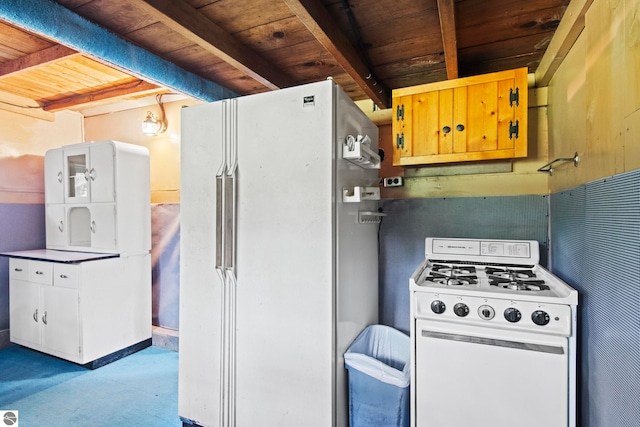 12570 N Cathead Point Rd, Northport, MI 49670 - kitchen with white appliances, carpet, and wooden ceiling with exposed beams