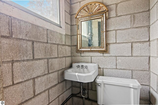 12570 N Cathead Point Rd, Northport, MI 49670 - half bath featuring toilet and a sink