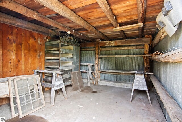 12570 N Cathead Point Rd, Northport, MI 49670 - miscellaneous room featuring concrete floors