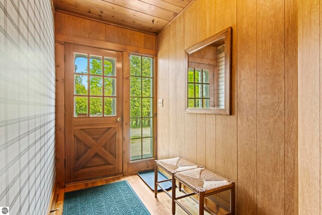 12570 N Cathead Point Rd, Northport, MI 49670 - entryway with wooden ceiling, wood finished floors, and wooden walls