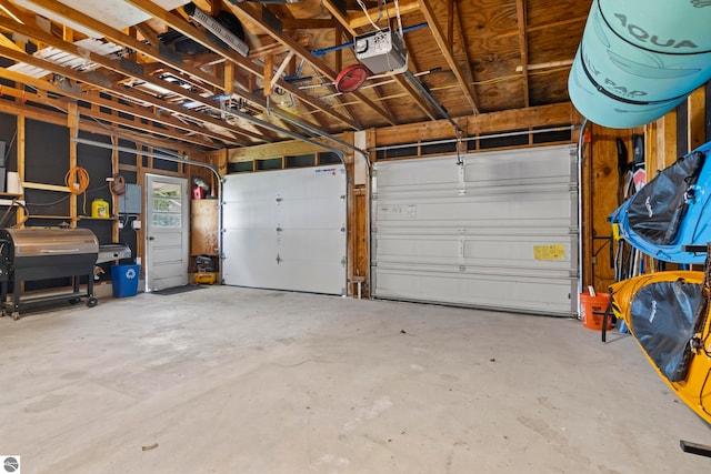 5896 S Cummings St, Suttons Bay, MI 49682 - garage with a garage door opener