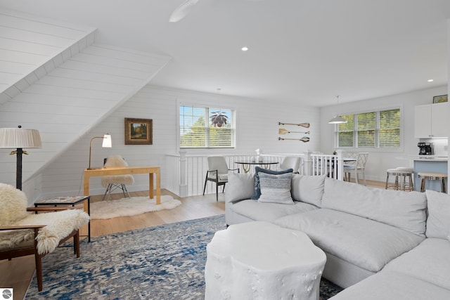 5896 S Cummings St, Suttons Bay, MI 49682 - living area featuring wood finished floors, recessed lighting, and baseboards