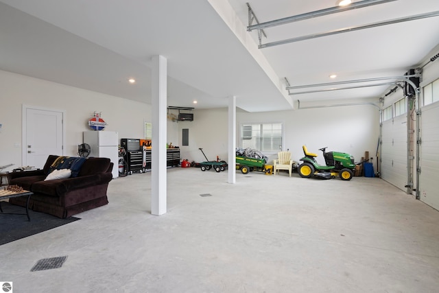 5896 S Cummings St, Suttons Bay, MI 49682 - garage with freestanding refrigerator and recessed lighting