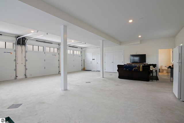 5896 S Cummings St, Suttons Bay, MI 49682 - garage with freestanding refrigerator and recessed lighting