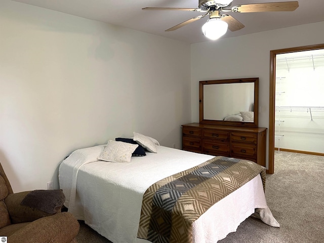 1619 E Gaylord St Unit A, Mount Pleasant, MI 48858 - carpeted bedroom with a ceiling fan, connected bathroom, and baseboards