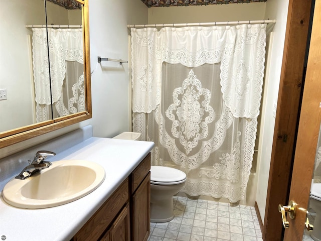 1619 E Gaylord St Unit A, Mount Pleasant, MI 48858 - bathroom featuring toilet, vanity, and shower / bath combo