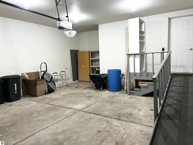 1619 E Gaylord St Unit A, Mount Pleasant, MI 48858 - garage featuring a garage door opener