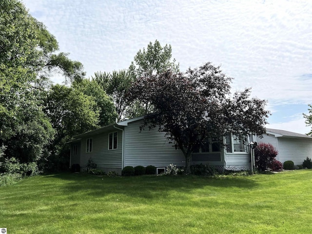 1619 E Gaylord St Unit A, Mount Pleasant, MI 48858 - view of property exterior with a yard