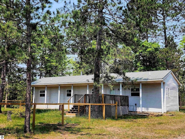 3764 E N Down River Rd, Grayling, MI 49738 - rear view of property featuring metal roof