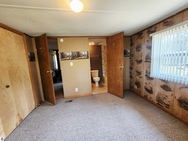 3764 E N Down River Rd, Grayling, MI 49738 - unfurnished bedroom with carpet floors and ensuite bathroom