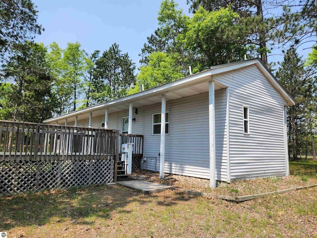 3764 E N Down River Rd, Grayling, MI 49738 - back of house with a wooden deck