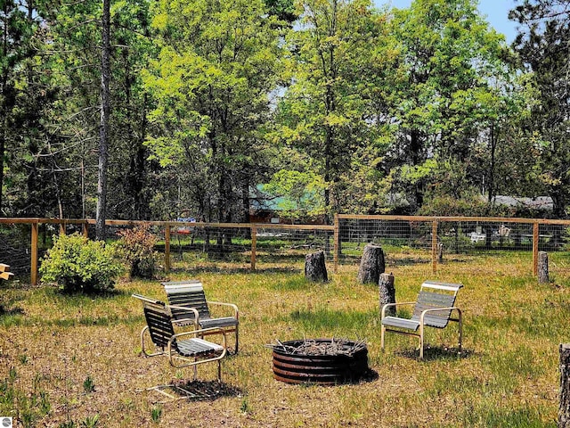 3764 E N Down River Rd, Grayling, MI 49738 - view of yard featuring a fire pit