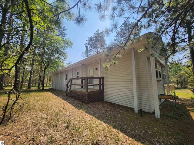 3764 E N Down River Rd, Grayling, MI 49738 - view of property exterior featuring a deck
