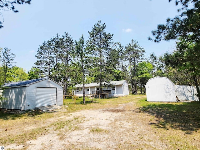 3764 E N Down River Rd, Grayling, MI 49738 - view of yard featuring view of wooded area