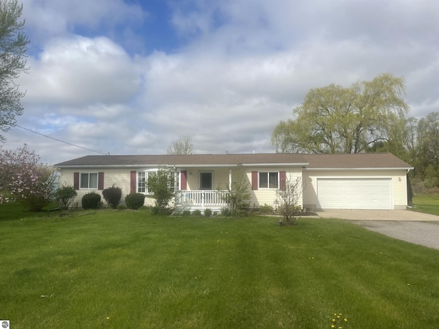 8571 N Seymour St, Flushing, MI 48433 - ranch-style house with concrete driveway, a porch, an attached garage, and a front lawn