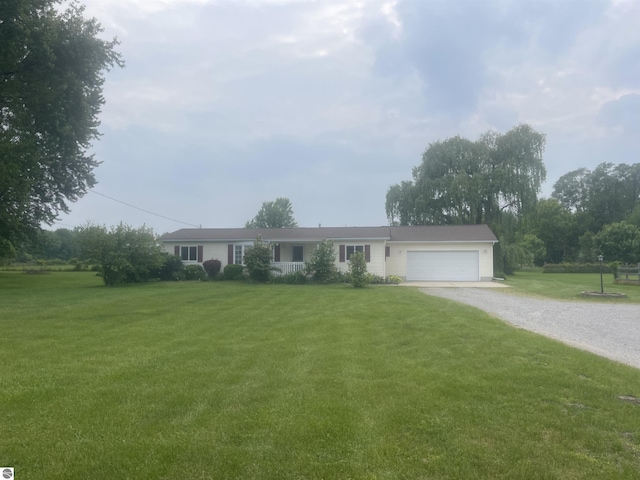 8571 N Seymour St, Flushing, MI 48433 - single story home featuring driveway, a garage, and a front lawn