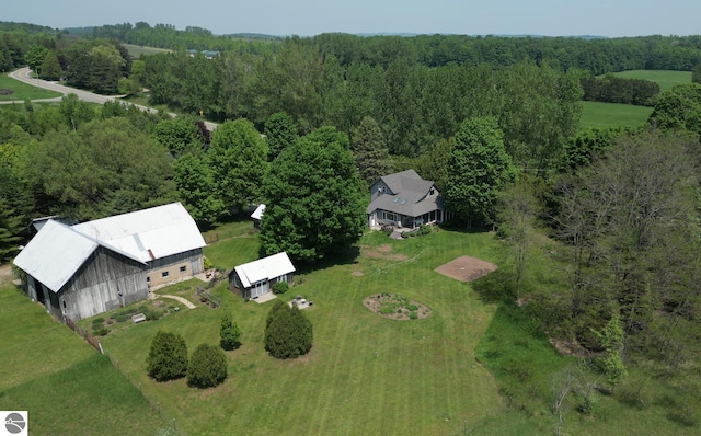 3362 S French Rd, Cedar, MI 49621 - aerial overview of property's location with a forest