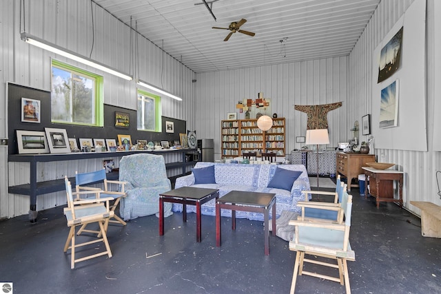 3362 S French Rd, Cedar, MI 49621 - living area featuring a ceiling fan, a high ceiling, and metal wall