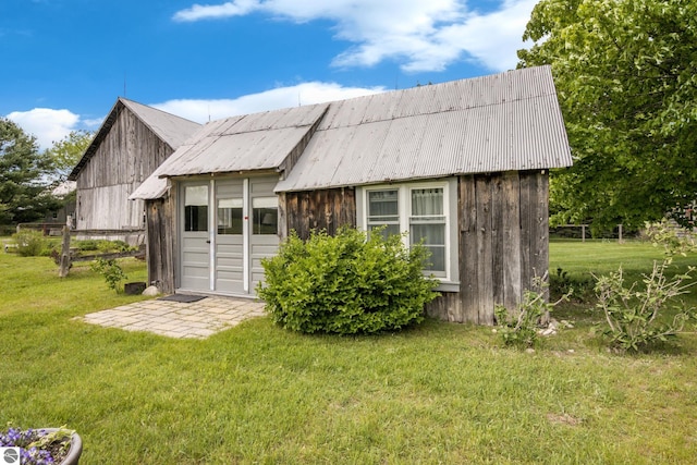 3362 S French Rd, Cedar, MI 49621 - back of property featuring a yard