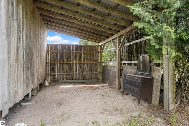 3362 S French Rd, Cedar, MI 49621 - view of patio featuring an exterior structure and an outdoor structure