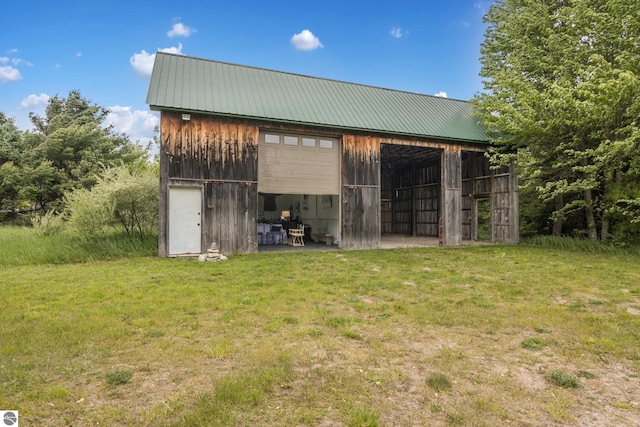 3362 S French Rd, Cedar, MI 49621 - view of pole building featuring a yard