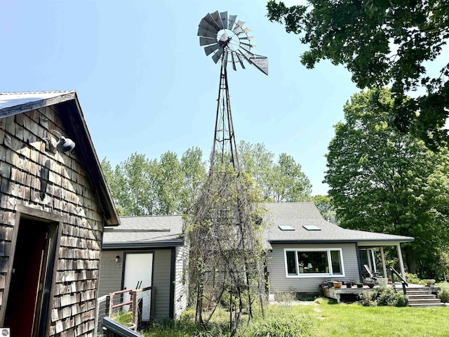 3362 S French Rd, Cedar, MI 49621 - back of property with a lawn