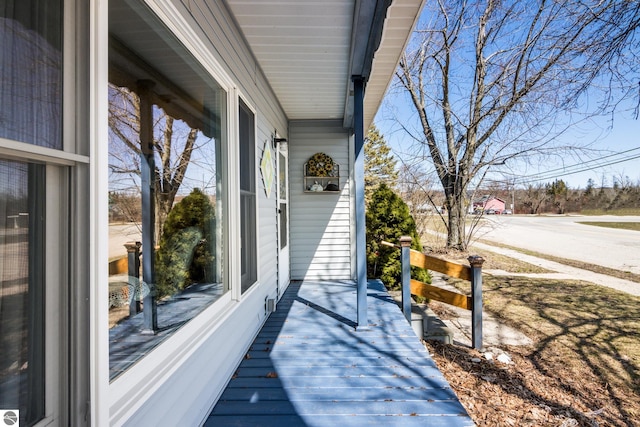 112 N Benzie Blvd, Beulah, MI 49617 - view of wooden porch
