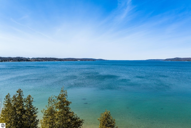 112 N Benzie Blvd, Beulah, MI 49617 - water view featuring a mountain backdrop