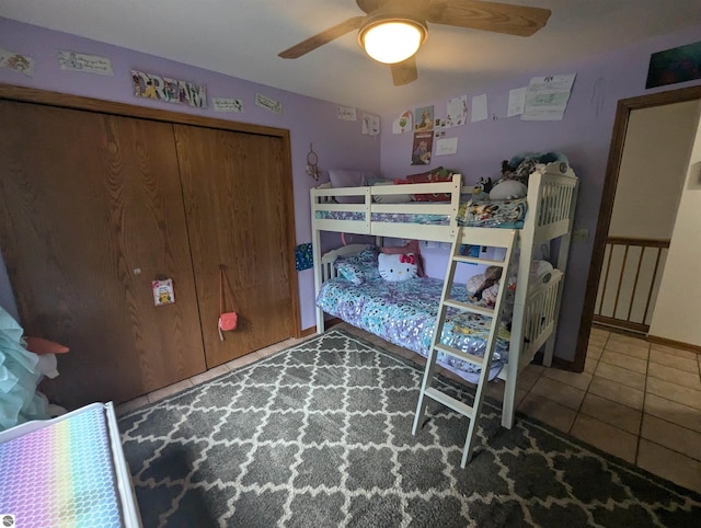 8544 Esmond Rd, Hale, MI 48739 - tiled bedroom with a ceiling fan and a closet