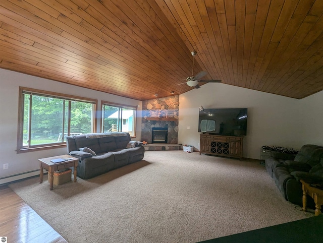 8544 Esmond Rd, Hale, MI 48739 - living area featuring healthy amount of natural light, ceiling fan, a stone fireplace, vaulted ceiling, and wood ceiling