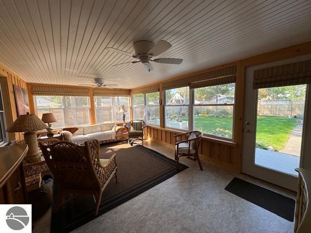 739 Stimson St, Cadillac, MI 49601 - sunroom / solarium featuring a ceiling fan and an outdoor living space