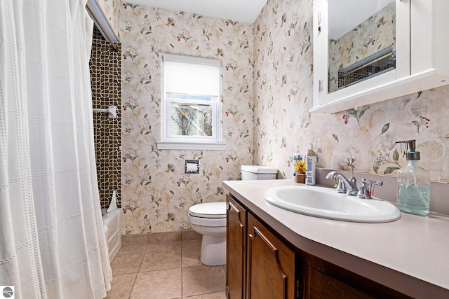 739 Stimson St, Cadillac, MI 49601 - bathroom featuring toilet, vanity, tile patterned floors, and shower / tub combo